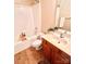 Bathroom featuring a bathtub, shower, and wood-look flooring at 11264 Hyde Pointe Ct, Charlotte, NC 28262