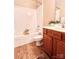 Bathroom featuring a bathtub, shower, and wood-look flooring at 11264 Hyde Pointe Ct, Charlotte, NC 28262