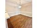 The dining room features wood floors, neutral walls, and a classic light fixture at 11264 Hyde Pointe Ct, Charlotte, NC 28262
