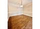 Bright dining room featuring wood floors and modern lighting at 11264 Hyde Pointe Ct, Charlotte, NC 28262