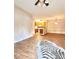 Open-concept living space with hardwood floors adjacent to the kitchen area at 11264 Hyde Pointe Ct, Charlotte, NC 28262