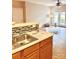 Open-concept living room with hardwood floors and patio access at 11264 Hyde Pointe Ct, Charlotte, NC 28262