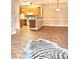 Inviting living space with an open layout, hardwood flooring, and access to kitchen at 11264 Hyde Pointe Ct, Charlotte, NC 28262
