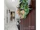 Inviting entryway featuring marble floors, neutral walls, and an ornate front door decoration at 6909 Green Haven Ln, Monroe, NC 28110