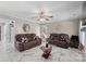 Comfortable living room featuring stylish furnishings, marble flooring, and a modern aesthetic at 6909 Green Haven Ln, Monroe, NC 28110