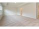 Bright bedroom with carpeted floor and access to bathroom at 10105 Mamillion Dr, Huntersville, NC 28078
