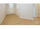 Light and bright foyer with wood-look flooring at 10105 Mamillion Dr, Huntersville, NC 28078