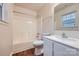 Clean bathroom with a tub, shower, and modern vanity with sink at 3004 Ridge Ave, Charlotte, NC 28208