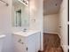 Modern bathroom featuring a stylish vanity and a mirrored wall cabinet at 3004 Ridge Ave, Charlotte, NC 28208
