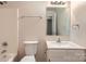 Well-lit bathroom featuring a modern vanity and classic fixtures at 3004 Ridge Ave, Charlotte, NC 28208