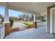 Inviting front porch view with brick pillars, white railings, and a glimpse of the neighborhood street at 3004 Ridge Ave, Charlotte, NC 28208