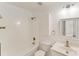 A clean bathroom features a shower-tub combo, vanity, and toilet at 563 Goldstaff Ln, Charlotte, NC 28273