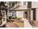 Charming home entrance with stone accents, manicured landscaping, and inviting front door at 563 Goldstaff Ln, Charlotte, NC 28273
