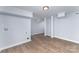 Spacious basement area featuring hard wood floors and decorative columns at 919 N Weldon St, Gastonia, NC 28052