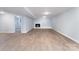 Spacious finished basement with fireplace, wood-look floors, and plenty of room to entertain at 919 N Weldon St, Gastonia, NC 28052