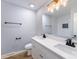 Modern bathroom features a double sink vanity, modern lighting and stylish fixtures at 919 N Weldon St, Gastonia, NC 28052