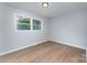 Cozy bedroom with ample natural light and laminate flooring at 919 N Weldon St, Gastonia, NC 28052