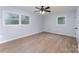 Bright bedroom with ample natural light and modern ceiling fan at 919 N Weldon St, Gastonia, NC 28052