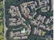 Aerial view showing home location within community and pool at 10105 Reindeer Way Ln, Charlotte, NC 28216