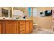 Bathroom boasts double vanity and a shower/tub combo at 10105 Reindeer Way Ln, Charlotte, NC 28216