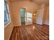 Spacious bedroom with wood flooring and walk-in closet at 10105 Reindeer Way Ln, Charlotte, NC 28216