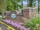 Holly Ridge community entrance with brick columns at 10105 Reindeer Way Ln, Charlotte, NC 28216