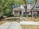 Inviting townhouse exterior with landscaping and walkway at 10105 Reindeer Way Ln, Charlotte, NC 28216