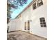 White vinyl sided home with private patio at 10105 Reindeer Way Ln, Charlotte, NC 28216