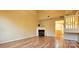 Living room with hardwood floors and fireplace at 10105 Reindeer Way Ln, Charlotte, NC 28216