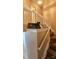 Staircase with wood railing and hardwood floors at 10105 Reindeer Way Ln, Charlotte, NC 28216