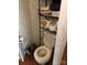 Bathroom with a toilet and storage rack for toiletries at 127 Deer Park Rd # D16, Mount Gilead, NC 27306