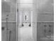 Luxurious bathroom showcasing a glass-enclosed shower and a separate soaking tub at 16921 Jetton Rd, Cornelius, NC 28031