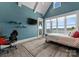 Bedroom with water views features a work space, patio access, and ensuite bath at 16921 Jetton Rd, Cornelius, NC 28031