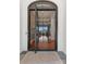 Grand foyer showcases beautiful hardwood floors and arched doorways with views to the lake at 16921 Jetton Rd, Cornelius, NC 28031