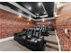 Luxurious home theater room with tiered seating, plush leather chairs, and a projector screen for ultimate entertainment at 16921 Jetton Rd, Cornelius, NC 28031