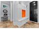 Functional mudroom with built-in storage, bench seating, and stylish tile flooring for organization and convenience at 16921 Jetton Rd, Cornelius, NC 28031