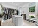 Spacious walk-in closet with custom shelving, drawers, and ample storage at 16921 Jetton Rd, Cornelius, NC 28031