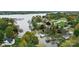 Panoramic aerial view capturing a serene lakefront community, highlighting beautiful homes, lush greenery, and tranquil waterways at 287 Ben Eller Ln, Taylorsville, NC 28681