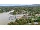 Overhead view of a scenic lake community, showing homes and docks surrounded by trees and water at 287 Ben Eller Ln, Taylorsville, NC 28681