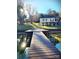 Waterfront home featuring a private wooden dock with direct access to the lake, beautiful landscaping and sunshine at 287 Ben Eller Ln, Taylorsville, NC 28681