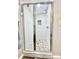This bathroom features a tile shower with glass door and stone look flooring at 287 Ben Eller Ln, Taylorsville, NC 28681