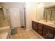 Large bathroom with double sinks, a shower, and a separate tub at 628 Barcroft Ln, Fort Mill, SC 29715
