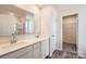 Bathroom with double vanity, shower, and access to a walk-in closet at 123 Dorian Pl, Troutman, NC 28166