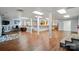 Open basement with laminate flooring, support columns, and kitchenette at 1567 Fayrene Rd, Rock Hill, SC 29732