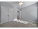 Bedroom with carpet and neutral walls has a large closet and interior door at 1567 Fayrene Rd, Rock Hill, SC 29732