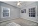Neutral bedroom with carpet, ceiling fan, and windows that let in light at 1567 Fayrene Rd, Rock Hill, SC 29732
