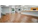 Open concept space with laminate flooring and white columns perfect for entertaining at 1567 Fayrene Rd, Rock Hill, SC 29732
