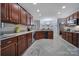 Open kitchen layout with plenty of cabinet space, stainless appliances, and eat-in dining area at 1567 Fayrene Rd, Rock Hill, SC 29732