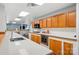 Eat in kitchen with white countertops, stainless steel appliances and wood cabinets at 1567 Fayrene Rd, Rock Hill, SC 29732
