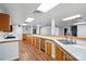 Spacious kitchen with stainless steel appliances, light countertops and wood cabinets at 1567 Fayrene Rd, Rock Hill, SC 29732